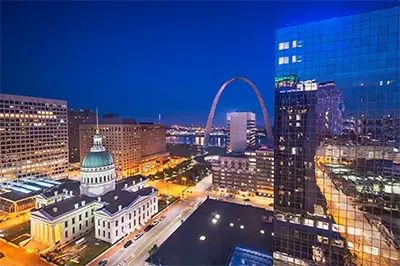 Nightime view of the St. Louis city skyline from Downtown Washington Avenue