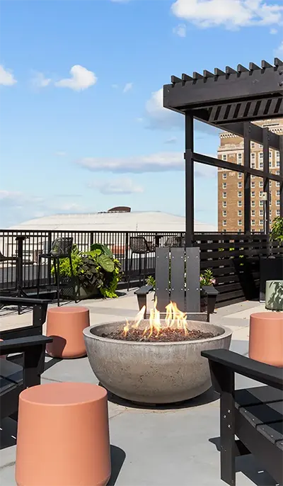 Rooftop Deck with Fire Pit and seating overlooking Downtown St. Louis City Views