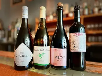 Close-up of wine bottles at 33 Wine Shop